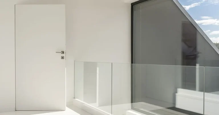 Home 3 Frameless door in a sunny home | the frameless door company
